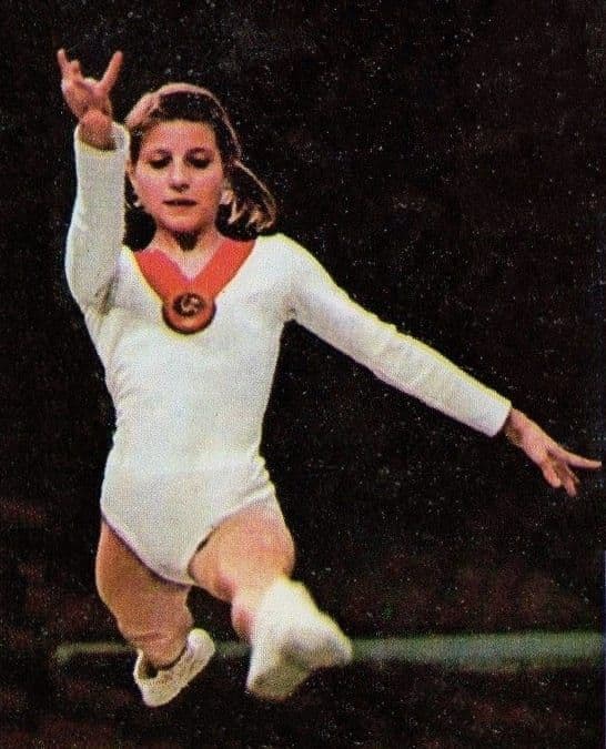 Olga Korbut performing a gymnastics floor exercise in a Soviet team leotard
